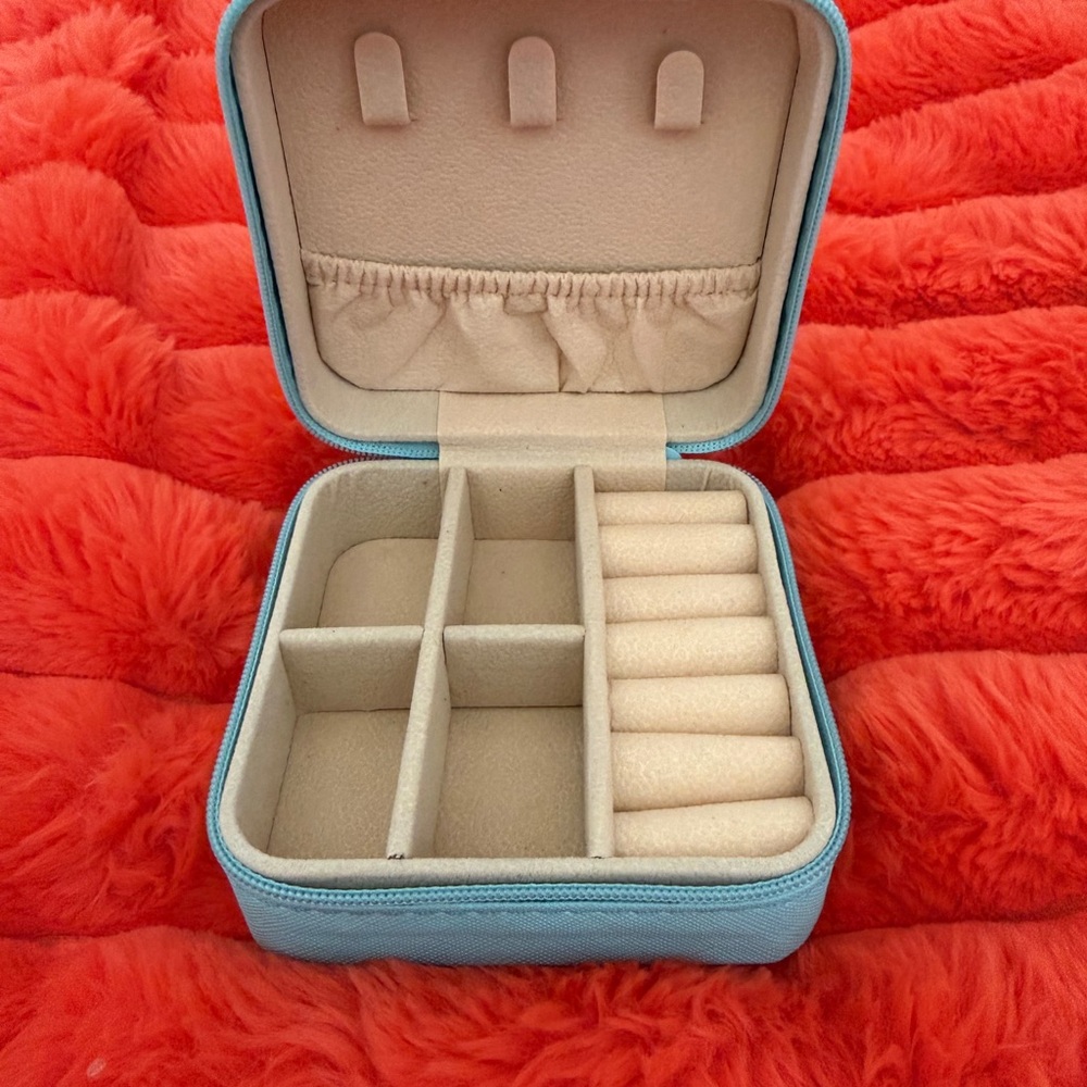 Light blue compact travel jewelry box